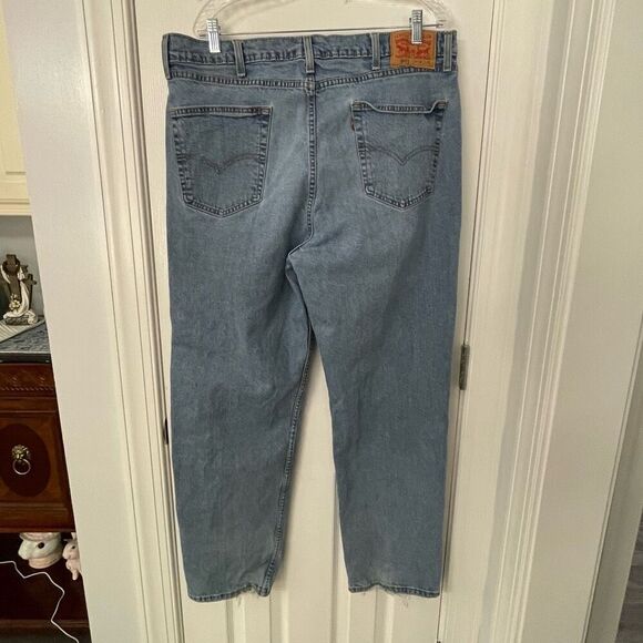 Levi’s 550 Relaxed Fit Jeans W40 L32 Light Wash Distressed Hem - Picture 2 of 10